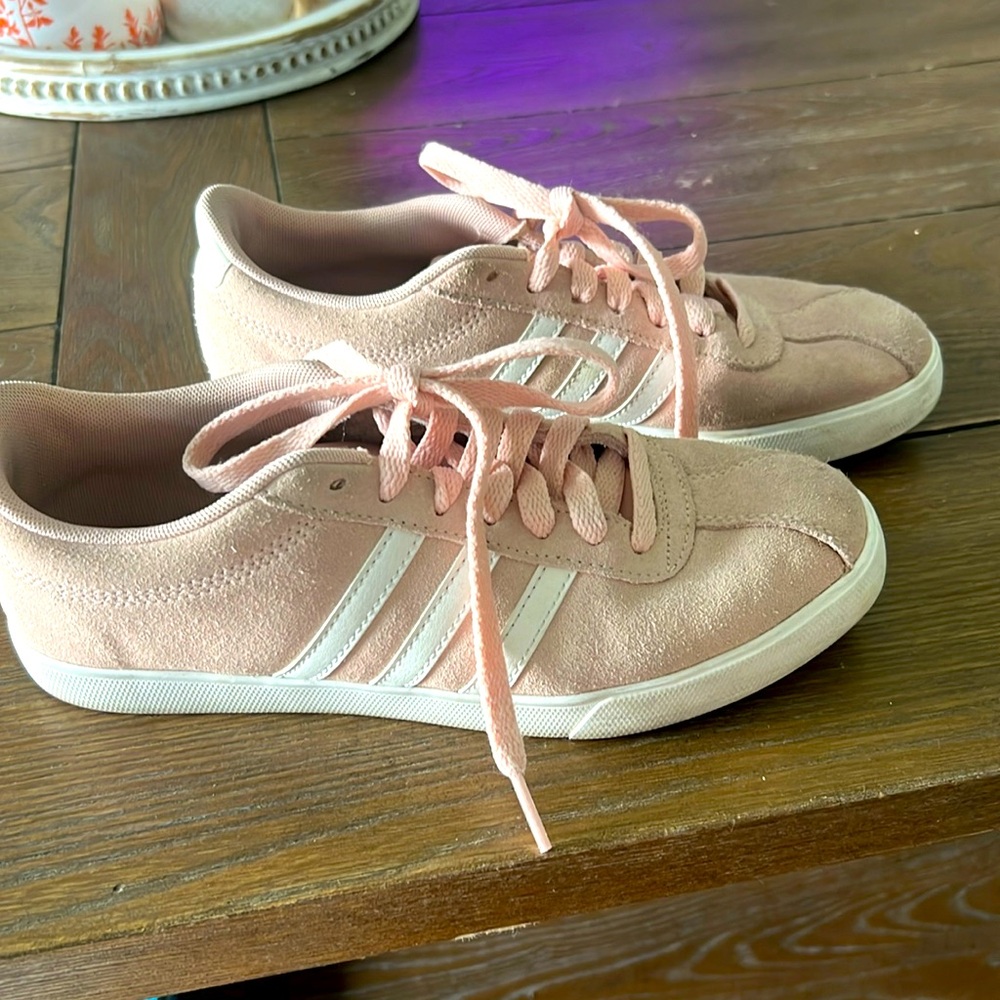 Pink adidas. They’re used but in good conditions